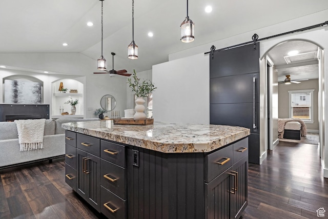 682 N 700 E, Lehi, UT 84043 - kitchen featuring built in features, a ceiling fan, dark wood-style floors, and vaulted ceiling