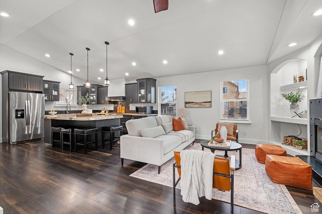 682 N 700 E, Lehi, UT 84043 - living area featuring recessed lighting, baseboards, lofted ceiling, and dark wood finished floors