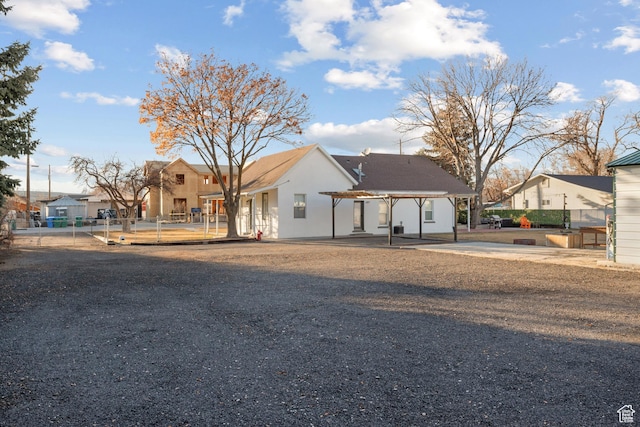 682 N 700 E, Lehi, UT 84043 - view of front of property featuring fence, a patio, a residential view, stucco siding, and a pergola