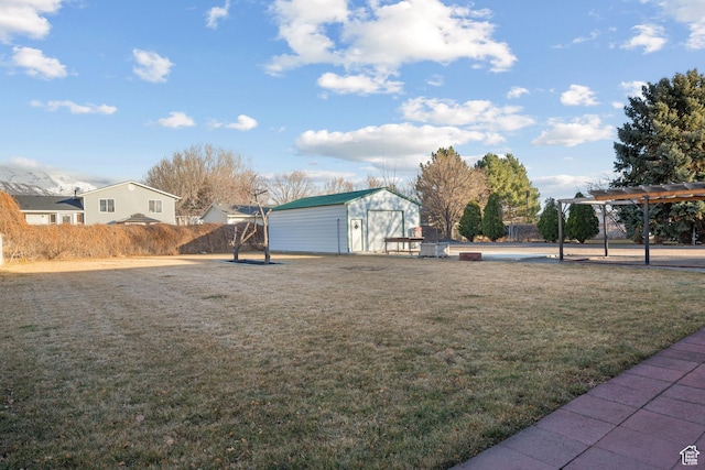 682 N 700 E, Lehi, UT 84043 - view of yard featuring an outbuilding, fence, a detached garage, a pergola, and a storage shed