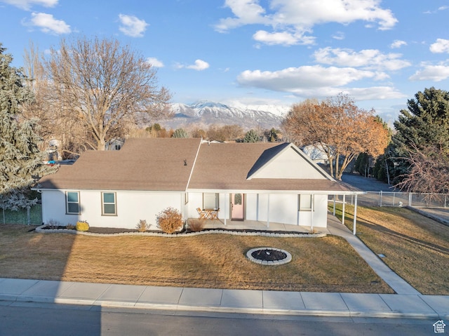 682 N 700 E, Lehi, UT 84043 - single story home featuring stucco siding, fence, a front yard, and a carport