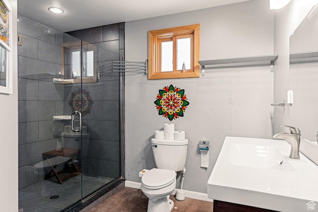 35 Lion Blvd, Springdale, UT 84767 - bathroom featuring a shower stall, baseboards, toilet, and vanity