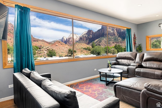 35 Lion Blvd, Springdale, UT 84767 - living room featuring baseboards, wood finished floors, and a mountain view