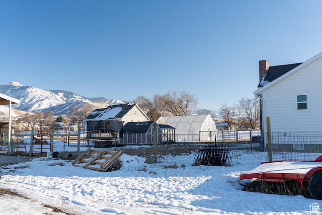 1009 E High Creek Rd, Cove, UT 84320 - snowy yard with a residential view and a mountain view