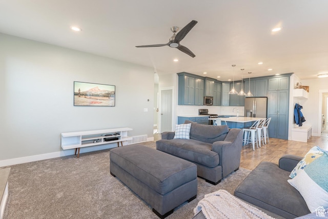 1009 E High Creek Rd, Cove, UT 84320 - living room featuring a ceiling fan, recessed lighting, and baseboards