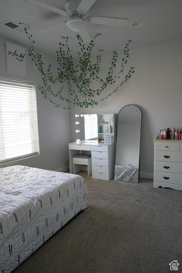 160 S 550 E Unit 18, Enterprise, UT 84725 - unfurnished bedroom featuring visible vents, ceiling fan, and carpet flooring
