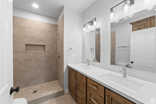 245 E Tidwell Ave Unit 5, Green River, UT 84525 - full bathroom featuring tile patterned floors, tiled shower, a sink, and toilet