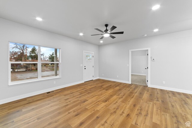 245 E Tidwell Ave Unit 5, Green River, UT 84525 - spare room featuring light wood-style flooring, a ceiling fan, recessed lighting, and baseboards