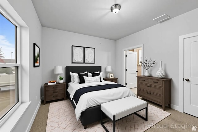 245 E Tidwell Ave Unit 5, Green River, UT 84525 - bedroom with light colored carpet and baseboards