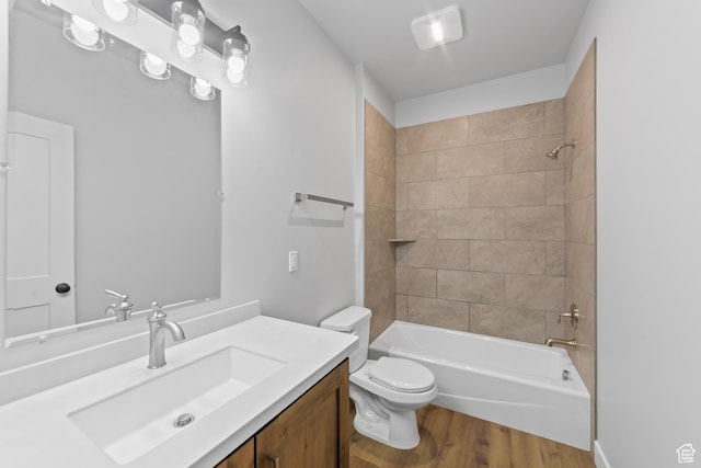 245 E Tidwell Ave Unit 5, Green River, UT 84525 - bathroom with toilet, wood finished floors, vanity, and shower / tub combination