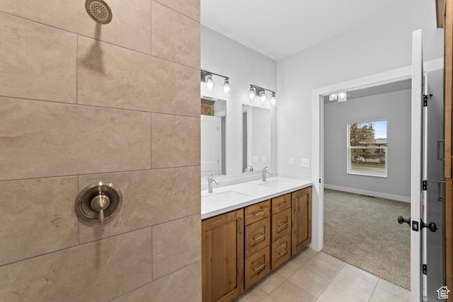 245 E Tidwell Ave Unit 5, Green River, UT 84525 - bathroom featuring a sink, tile patterned floors, double vanity, and baseboards