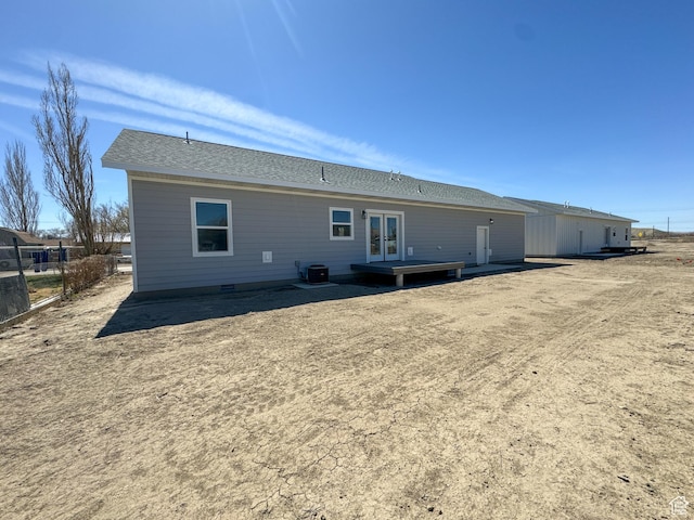 245 E Tidwell Ave Unit 5, Green River, UT 84525 - back of property featuring cooling unit and french doors