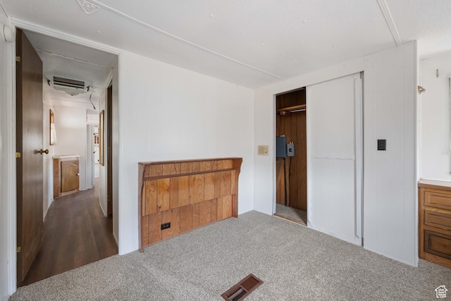 102 N 3910 W, Hurricane, UT 84737 - carpeted bedroom featuring a wall unit AC, a closet, and visible vents
