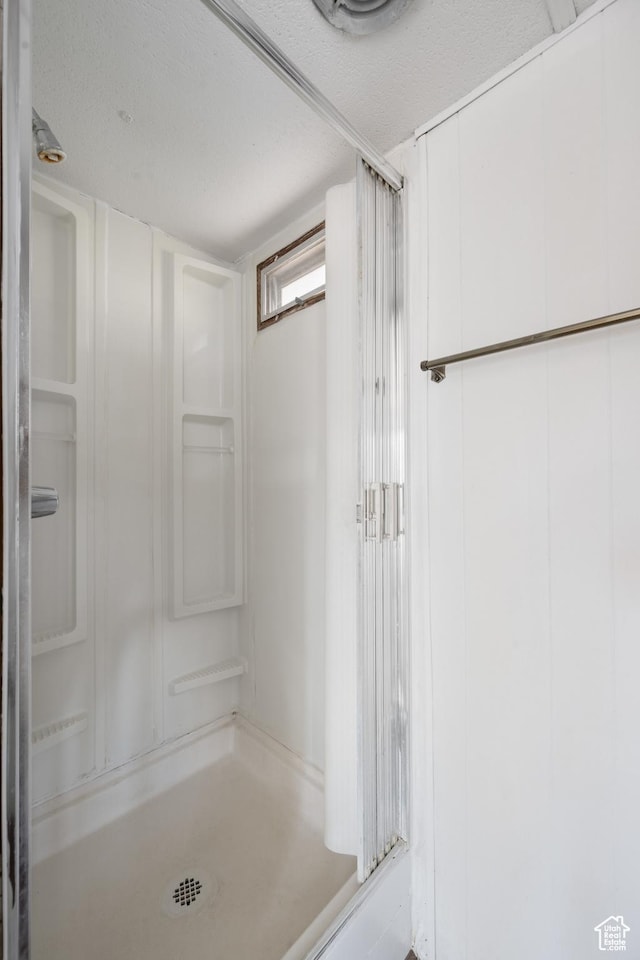 102 N 3910 W, Hurricane, UT 84737 - full bath featuring a textured ceiling and walk in shower