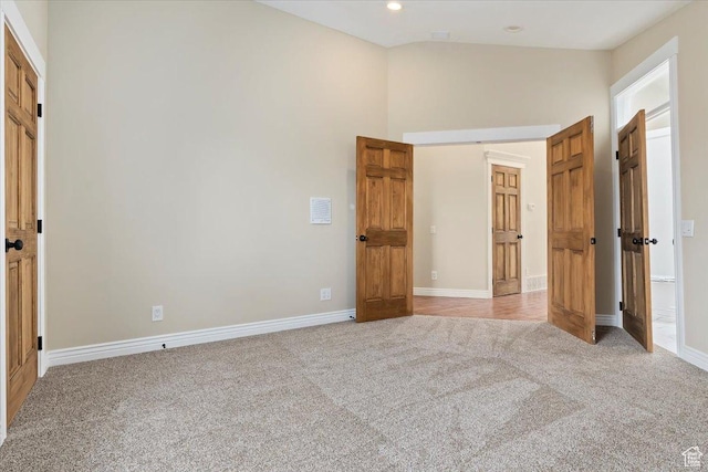7342 S Promenade Cir E, Cottonwood Heights, UT 84121 - unfurnished bedroom with a towering ceiling, light carpet, baseboards, and recessed lighting