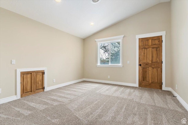 7342 S Promenade Cir E, Cottonwood Heights, UT 84121 - carpeted spare room with baseboards and lofted ceiling