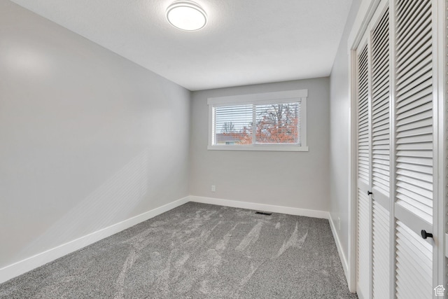 975 N 200 E, Lehi, UT 84043 - unfurnished bedroom featuring a closet, visible vents, baseboards, and carpet