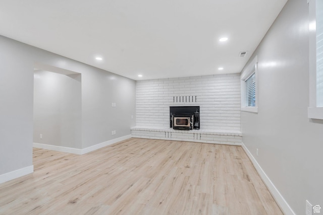 975 N 200 E, Lehi, UT 84043 - unfurnished living room featuring baseboards, visible vents, and wood finished floors