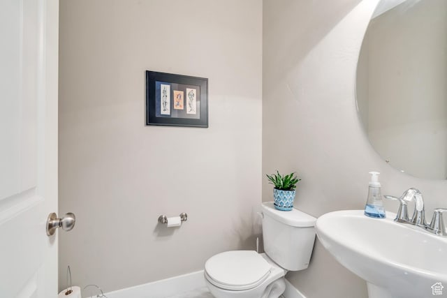 680 S Appenzell Ln, Midway, UT 84049 - bathroom with baseboards, a sink, and toilet