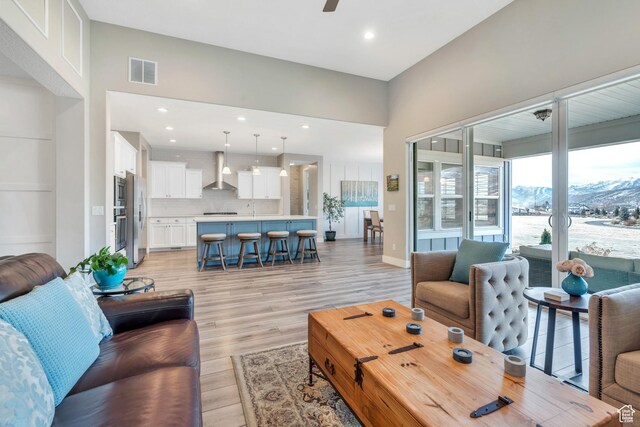 680 S Appenzell Ln, Midway, UT 84049 - living area featuring light wood-style flooring, visible vents, recessed lighting, and a ceiling fan