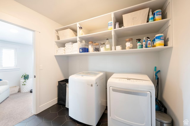 52 N 400 W, Farmington, UT 84025 - washroom with baseboards, dark carpet, dark tile patterned floors, laundry area, and washing machine and clothes dryer