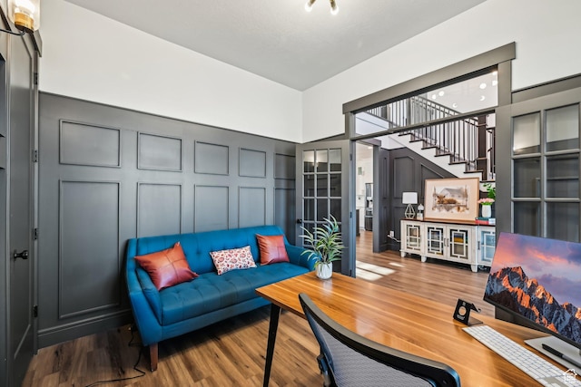 52 N 400 W, Farmington, UT 84025 - living room featuring wood finished floors, a decorative wall, and stairway