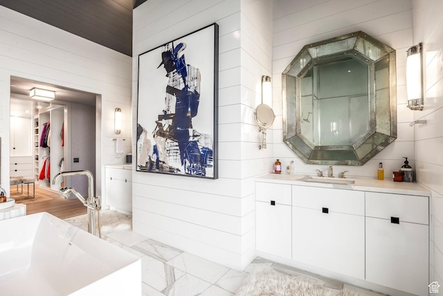 8006 N Sunrise Loop, Park City, UT 84098 - bathroom featuring marble finish floor, wooden walls, and vanity