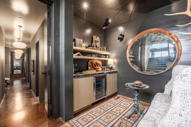8006 N Sunrise Loop, Park City, UT 84098 - bar with baseboards, beverage cooler, wet bar, and wooden walls