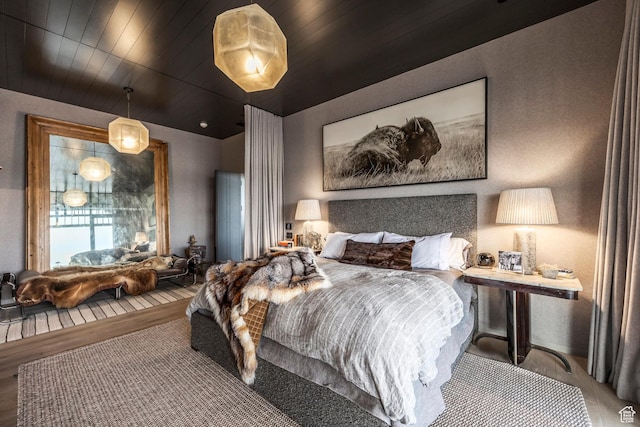 8006 N Sunrise Loop, Park City, UT 84098 - bedroom with wood finished floors and wooden ceiling