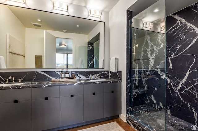 8006 N Sunrise Loop, Park City, UT 84098 - full bath featuring double vanity, visible vents, a sink, and a marble finish shower