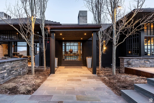 8006 N Sunrise Loop, Park City, UT 84098 - doorway to property featuring a chimney