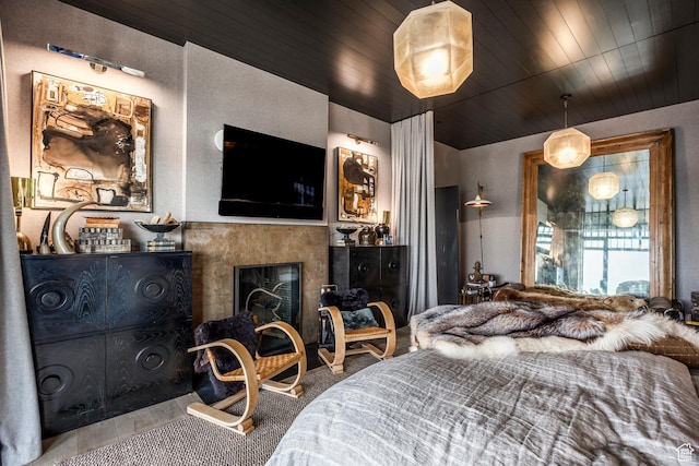 8006 N Sunrise Loop, Park City, UT 84098 - bedroom featuring a fireplace and wooden ceiling