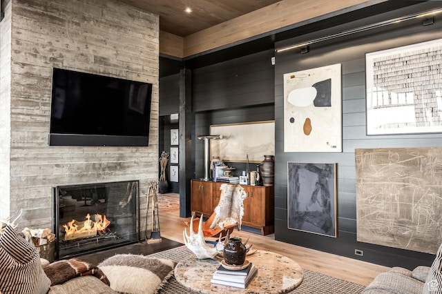 8006 N Sunrise Loop, Park City, UT 84098 - living room featuring a fireplace, wood finished floors, and wood ceiling