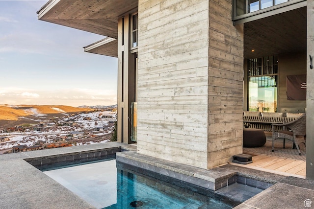 8006 N Sunrise Loop, Park City, UT 84098 - view of swimming pool featuring a mountain view and a pool