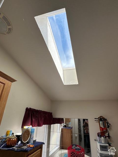 interior details featuring visible vents and a skylight