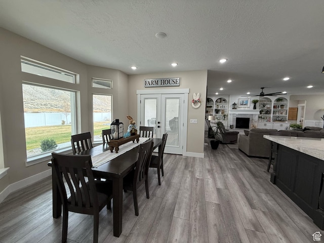 1240 W 2360 N, Helper, UT 84526 - dining room featuring light wood-style flooring, recessed lighting, baseboards, a textured ceiling, and a ceiling fan