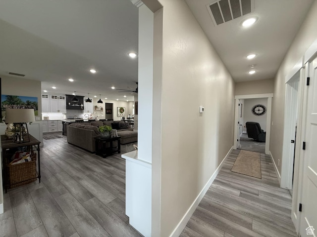 1240 W 2360 N, Helper, UT 84526 - hall with baseboards, visible vents, light wood-style floors, and recessed lighting