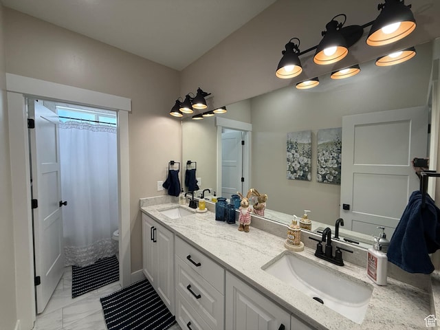 1240 W 2360 N, Helper, UT 84526 - full bathroom featuring marble finish floor, double vanity, a shower with shower curtain, and a sink