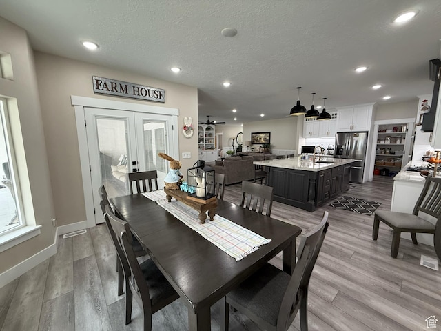1240 W 2360 N, Helper, UT 84526 - dining area featuring recessed lighting, light wood-style flooring, and french doors