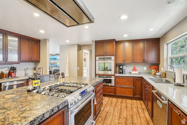 1349 E Madera Hills Dr S, Bountiful, UT 84010 - kitchen featuring ventilation hood, recessed lighting, appliances with stainless steel finishes, a sink, and light wood finished floors