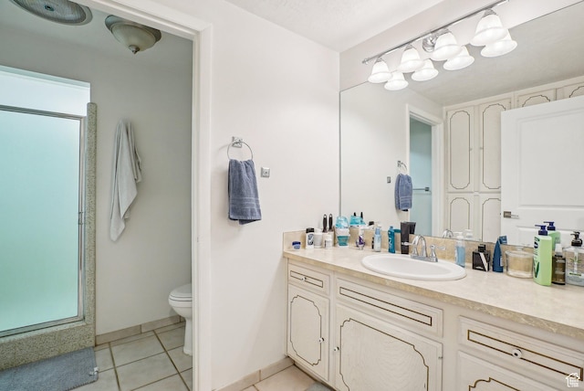 1349 E Madera Hills Dr S, Bountiful, UT 84010 - bathroom with toilet, tile patterned floors, vanity, and baseboards