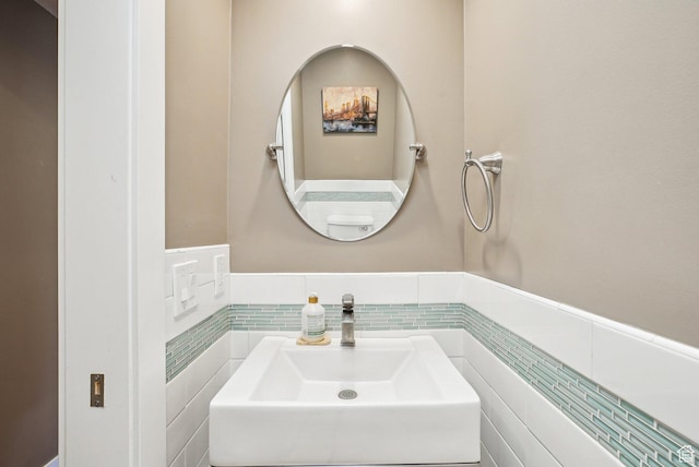 1349 E Madera Hills Dr S, Bountiful, UT 84010 - bathroom featuring a sink, tile walls, and a wainscoted wall