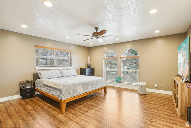 1349 E Madera Hills Dr S, Bountiful, UT 84010 - bedroom featuring light wood-type flooring, baseboards, recessed lighting, a textured ceiling, and ceiling fan