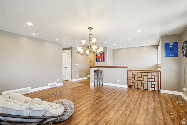 1349 E Madera Hills Dr S, Bountiful, UT 84010 - living area with a chandelier, visible vents, baseboards, and wood finished floors