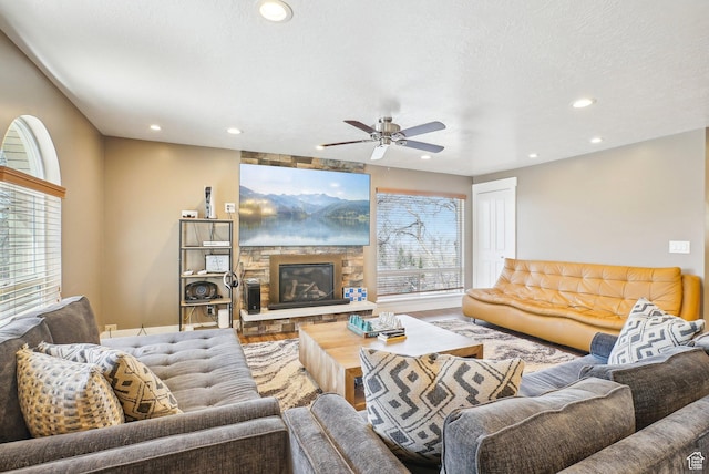 1349 E Madera Hills Dr S, Bountiful, UT 84010 - living room featuring recessed lighting, a stone fireplace, a ceiling fan, and a textured ceiling