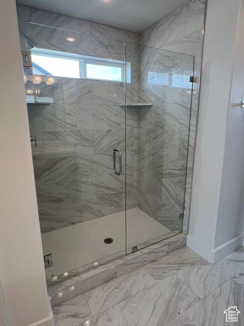 3199 N 3500 W Unit 379, Plain City, UT 84404 - bathroom with a marble finish shower and marble finish flooring