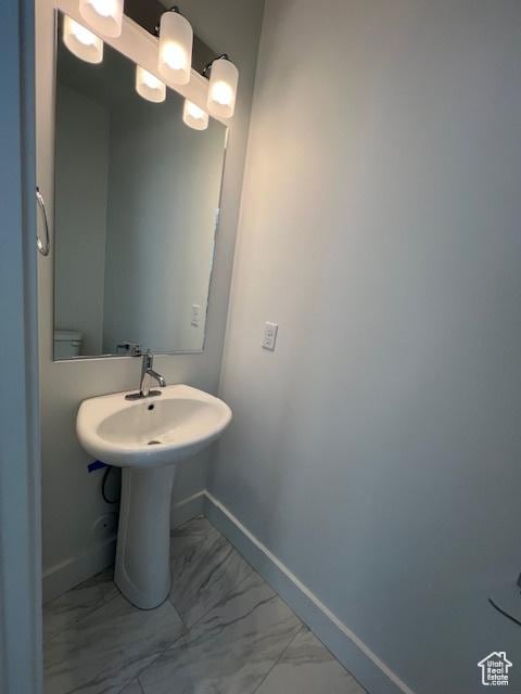 3199 N 3500 W Unit 379, Plain City, UT 84404 - bathroom featuring marble finish flooring and baseboards