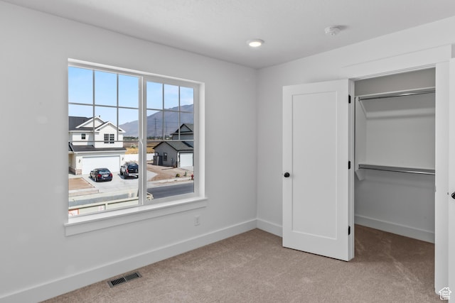 3199 N 3500 W Unit 379, Plain City, UT 84404 - unfurnished bedroom with baseboards, visible vents, and carpet