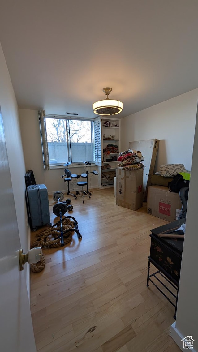 777 E S Temple Unit 3J, Salt Lake City, UT 84102 - miscellaneous room featuring light wood-style floors