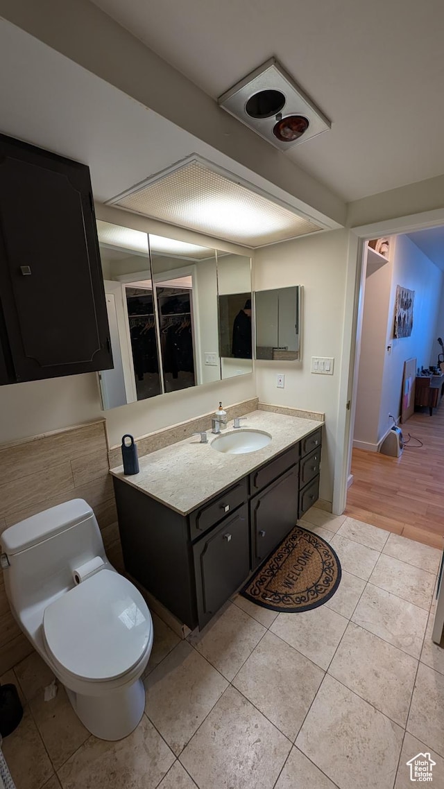 777 E S Temple Unit 3J, Salt Lake City, UT 84102 - bathroom with tile patterned floors, vanity, and toilet